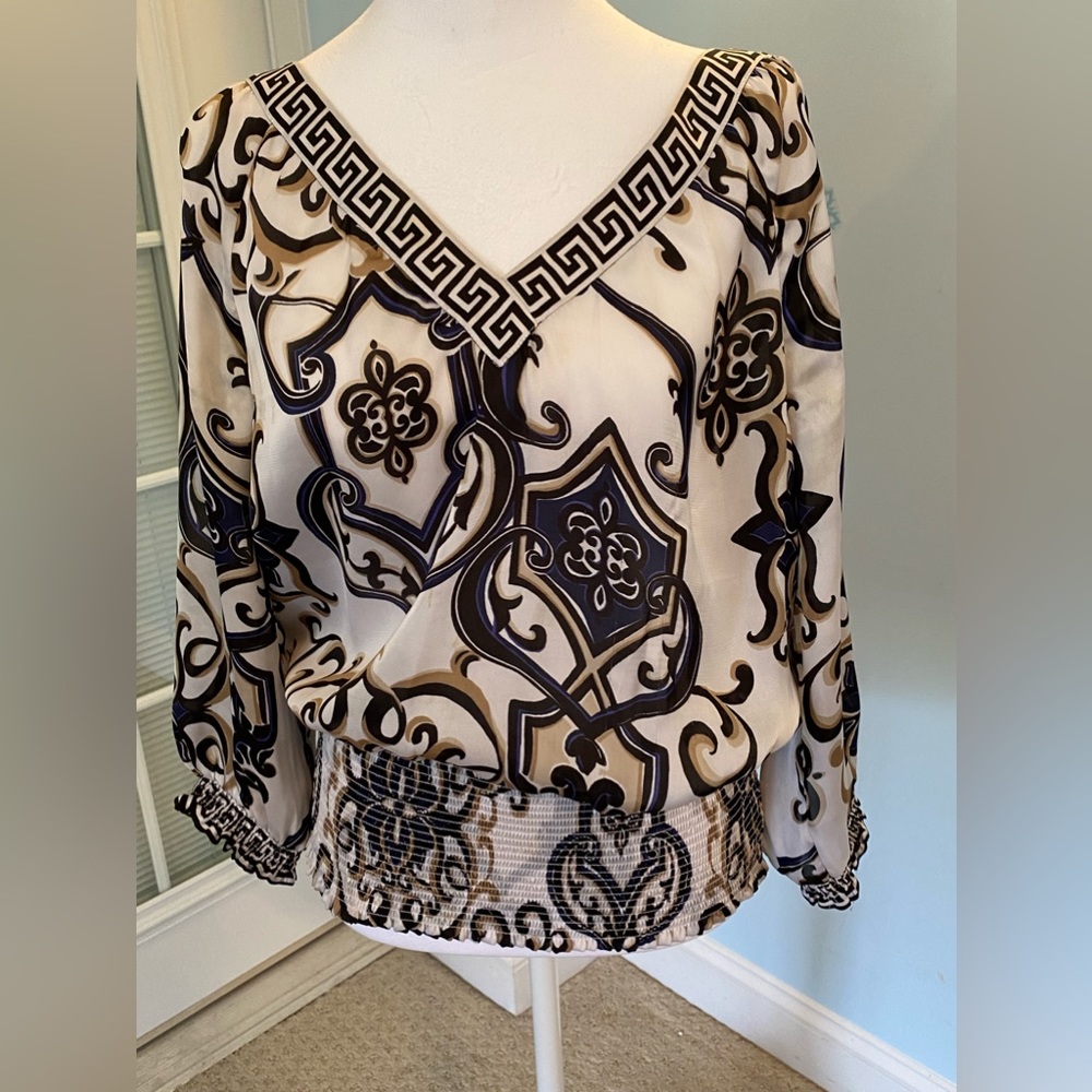 Women’s blouse M elastic at the waste. First really cute